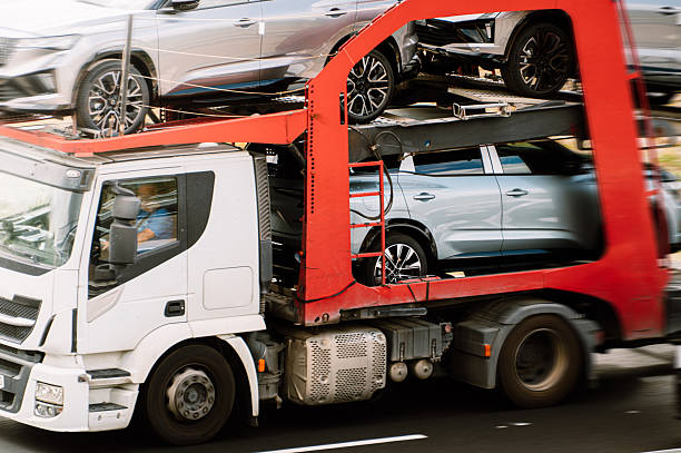 Detail of a car carrier truck in motion
